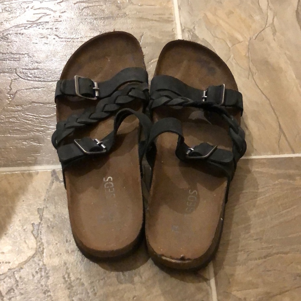 Black strappy leather sandals